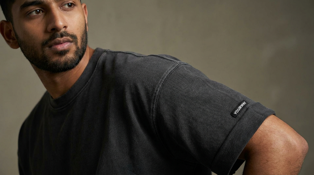 Close-up of a YOURWAY oversized t-shirt shoulder seam showing true drop shoulder construction and stitching detail