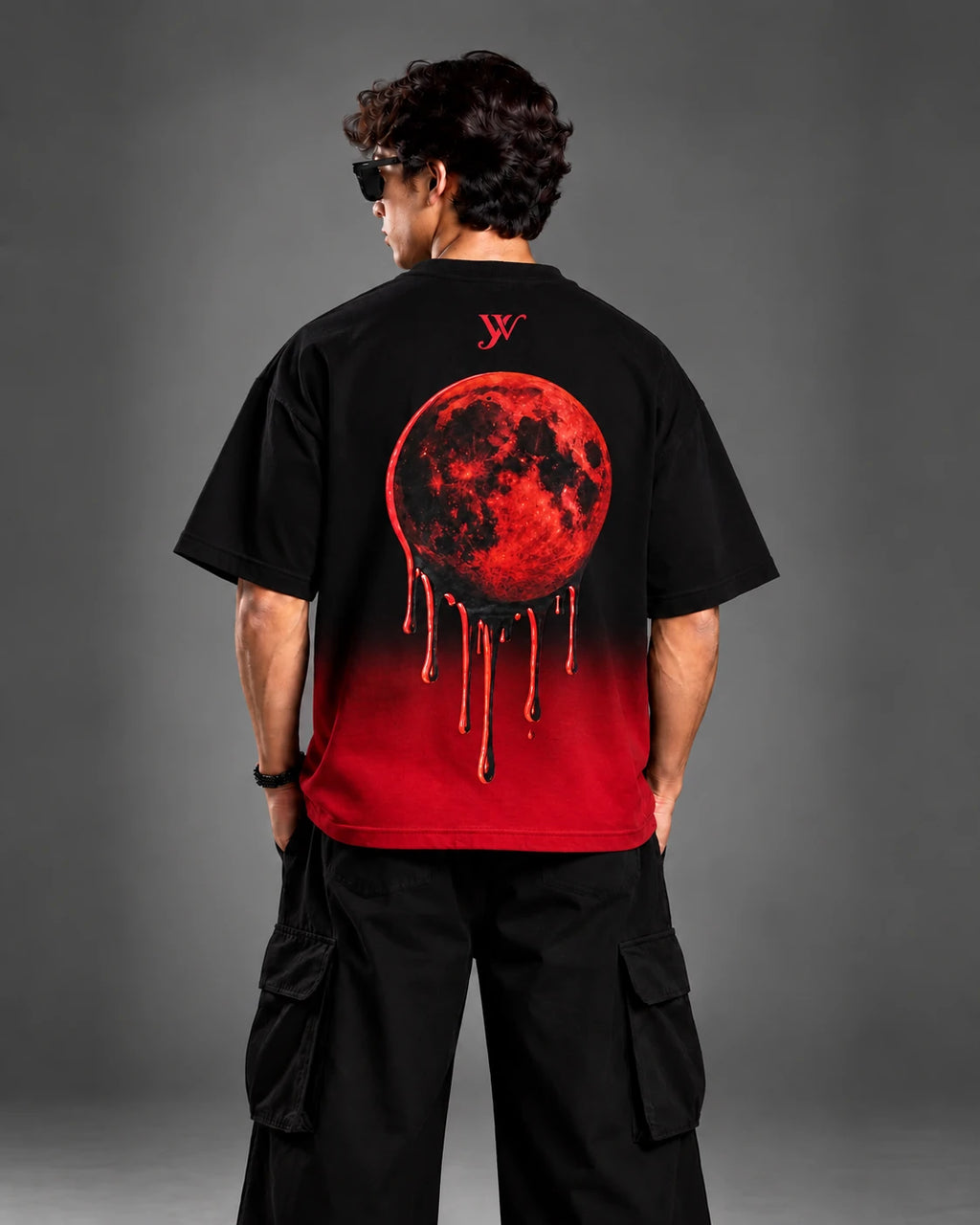 Crimson moon drip graphic close-up on the back of the Blood Moon Black Ombre Tee
