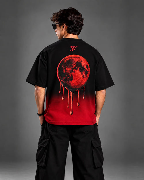 Crimson moon drip graphic close-up on the back of the Blood Moon Black Ombre Tee