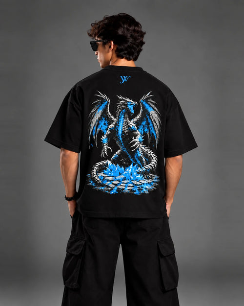 Model wearing the oversized Blue Ice Dragon T-Shirt, back view showing the ice dragon graphic perched on crystal shards