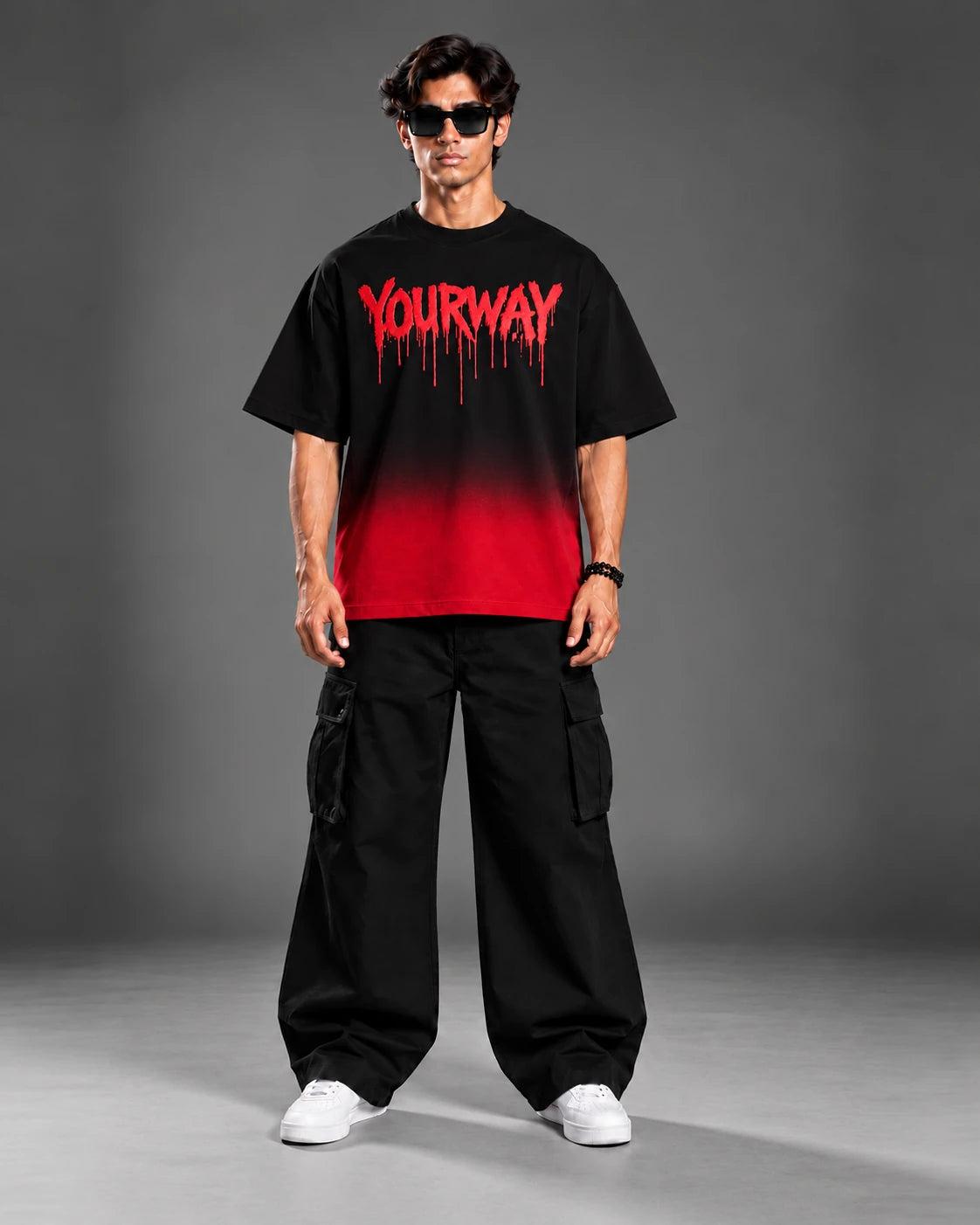Studio portrait of model wearing the Blood Moon Black Ombre Tee with oversized drop-shoulder fit