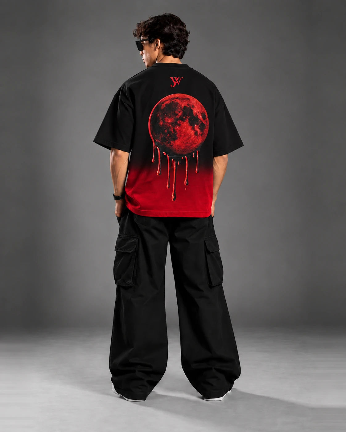 Back view of Blood Moon Black Ombre Tee showing the crimson moon graphic fading into the ombre hem