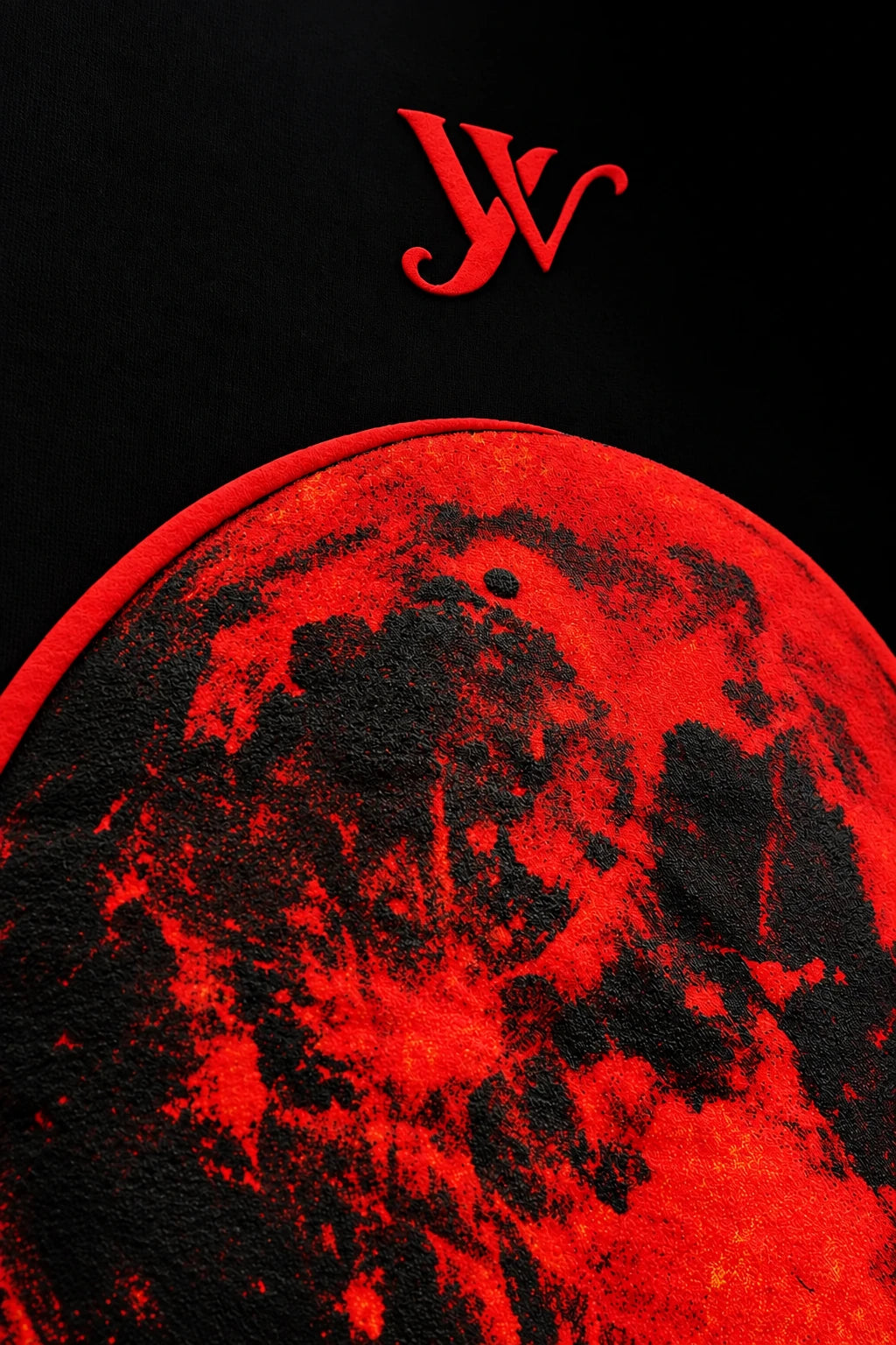 Close-up of raised puff-print red moon graphic on Blood Moon Black Ombre Tee fabric