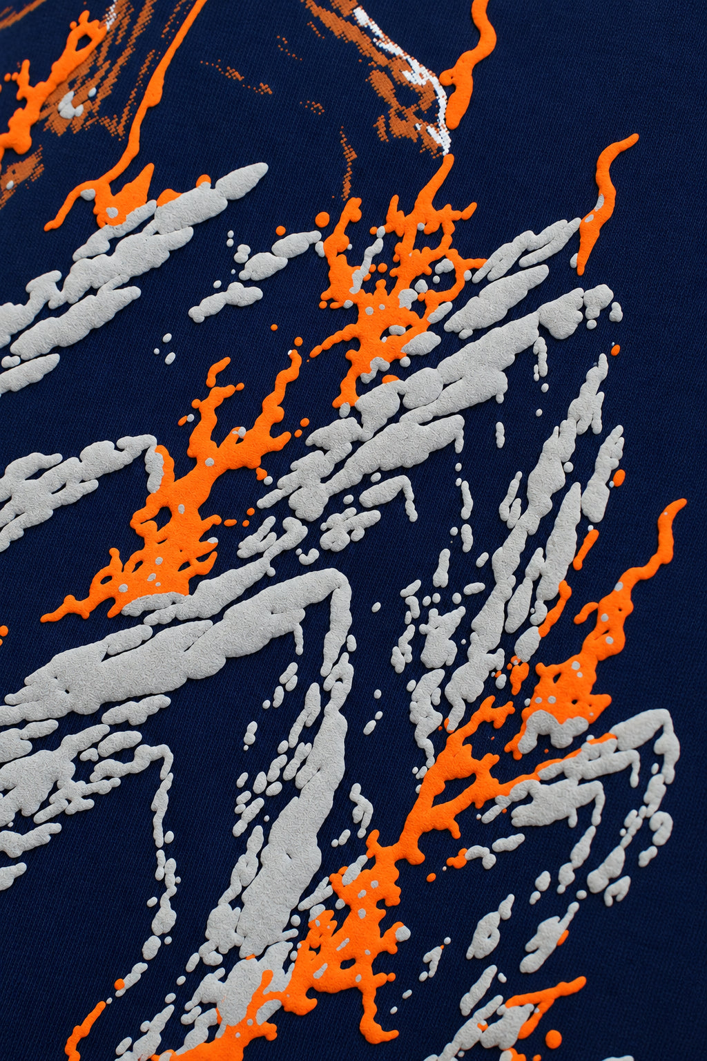 Close-up of the textured orange and grey puff print flames on the men's Navy Fire Horse T-Shirt