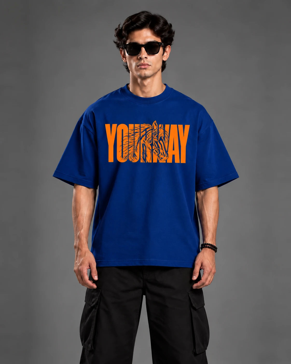 Studio portrait of model wearing the men's Navy Fire Horse T-Shirt, front view with YOURWAY horse silhouette wordmark