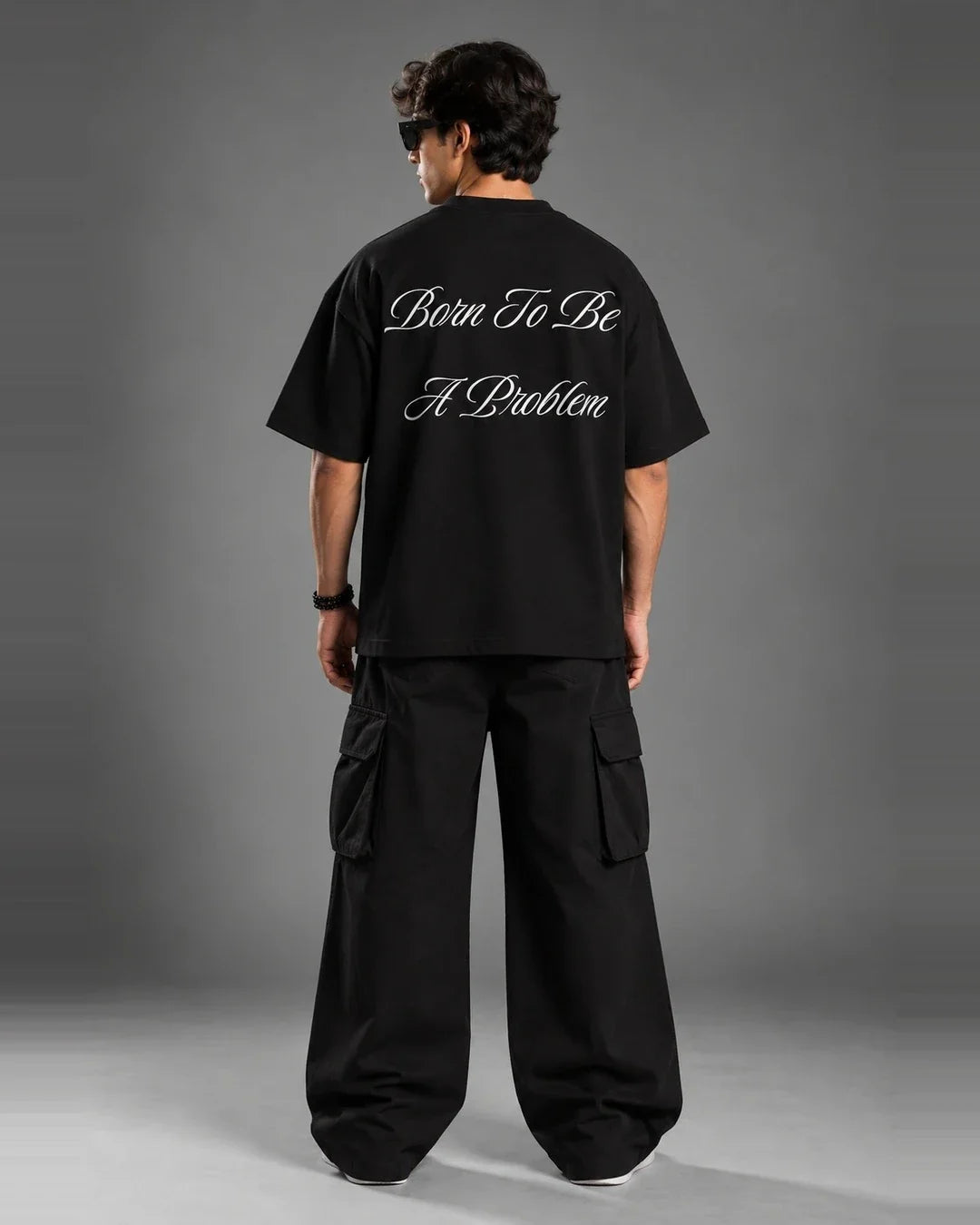 Born To Be A Problem black graphic tee back angled view