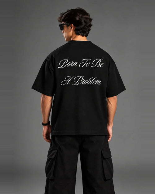 Born To Be A Problem t-shirt back view over shoulder