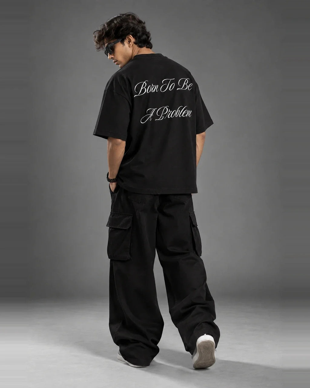 Born To Be A Problem t-shirt back walking shot streetwear